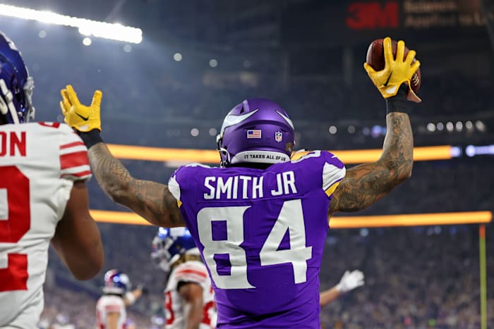 Jan 15, 2023; Minneapolis, Minnesota, USA; Minnesota Vikings tight end Irv Smith Jr. (84) reacts after making a catch for a touchdown against the New York Giants during the third quarter of a wild card game at U.S. Bank Stadium. Mandatory Credit: Matt Krohn-USA TODAY Sports